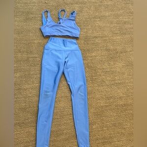 ALO yoga blue workout bra and leggings